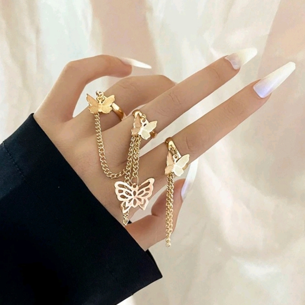 Gold butterfly chain rings